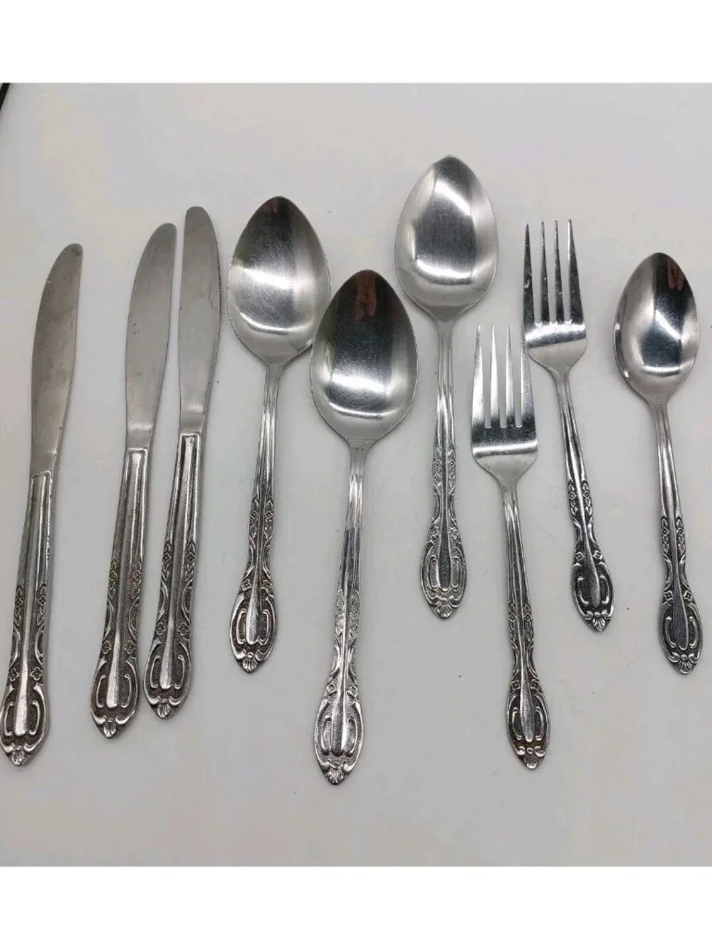 Northland Korea Stainless Flatware w Roses Spoons Knives Forks Lot Of 9